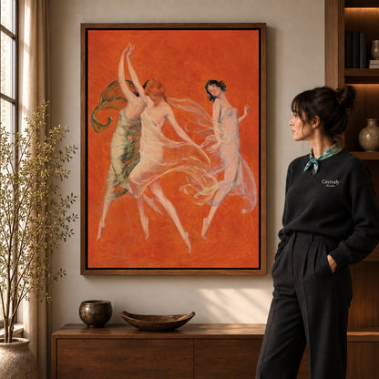 Walnut framed graceful dancers canvas art shown beside a standing woman and a wooden console.