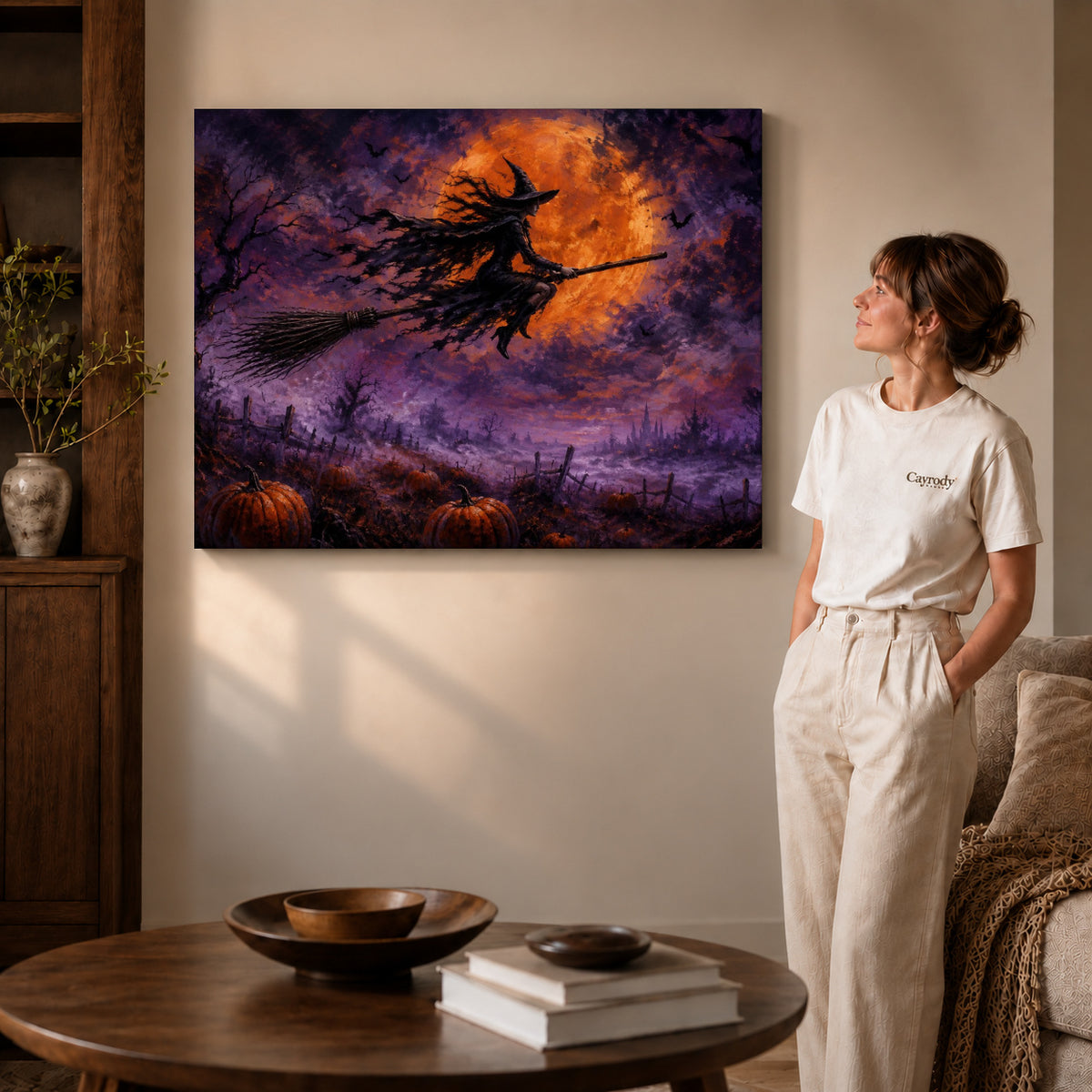 Witch Canvas Art on gallery wrapped canvas with visible depth beside a woman in white.