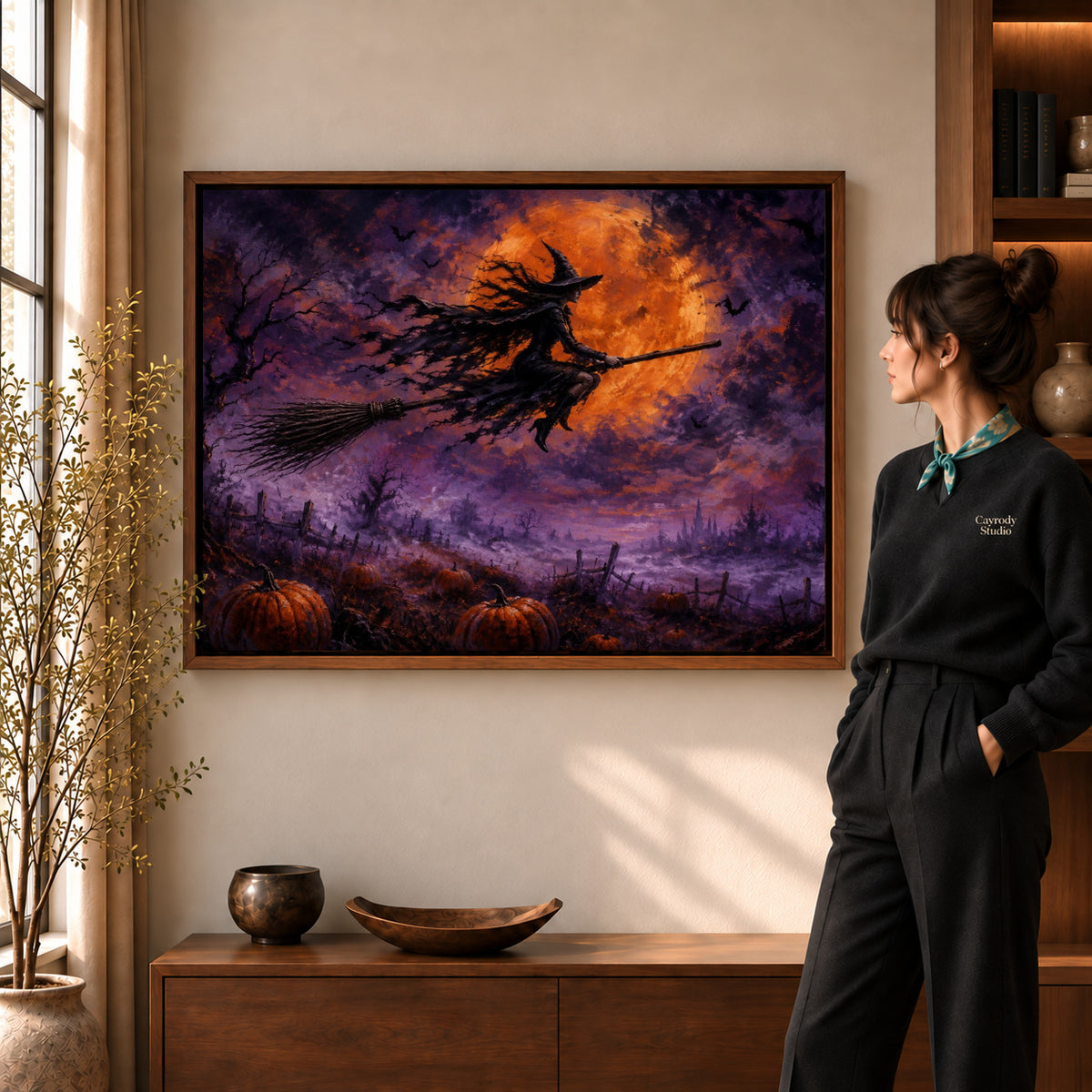 Walnut framed witch canvas art with the complete artwork displayed in a warm living room.