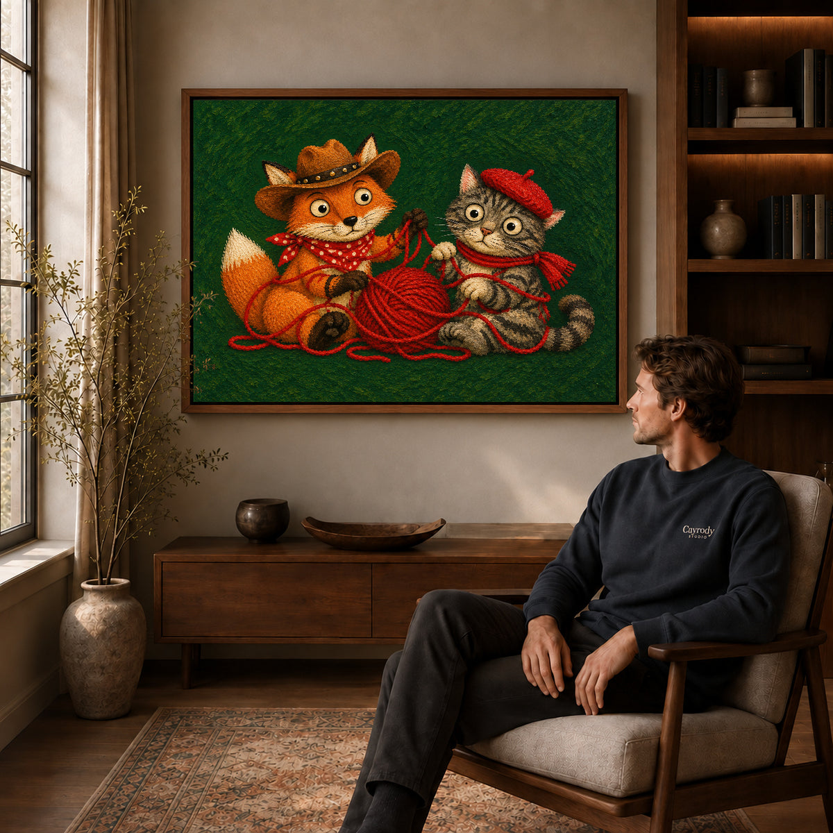 Fox Cat Canvas Art displayed in a walnut frame above wooden furniture beside a seated man.