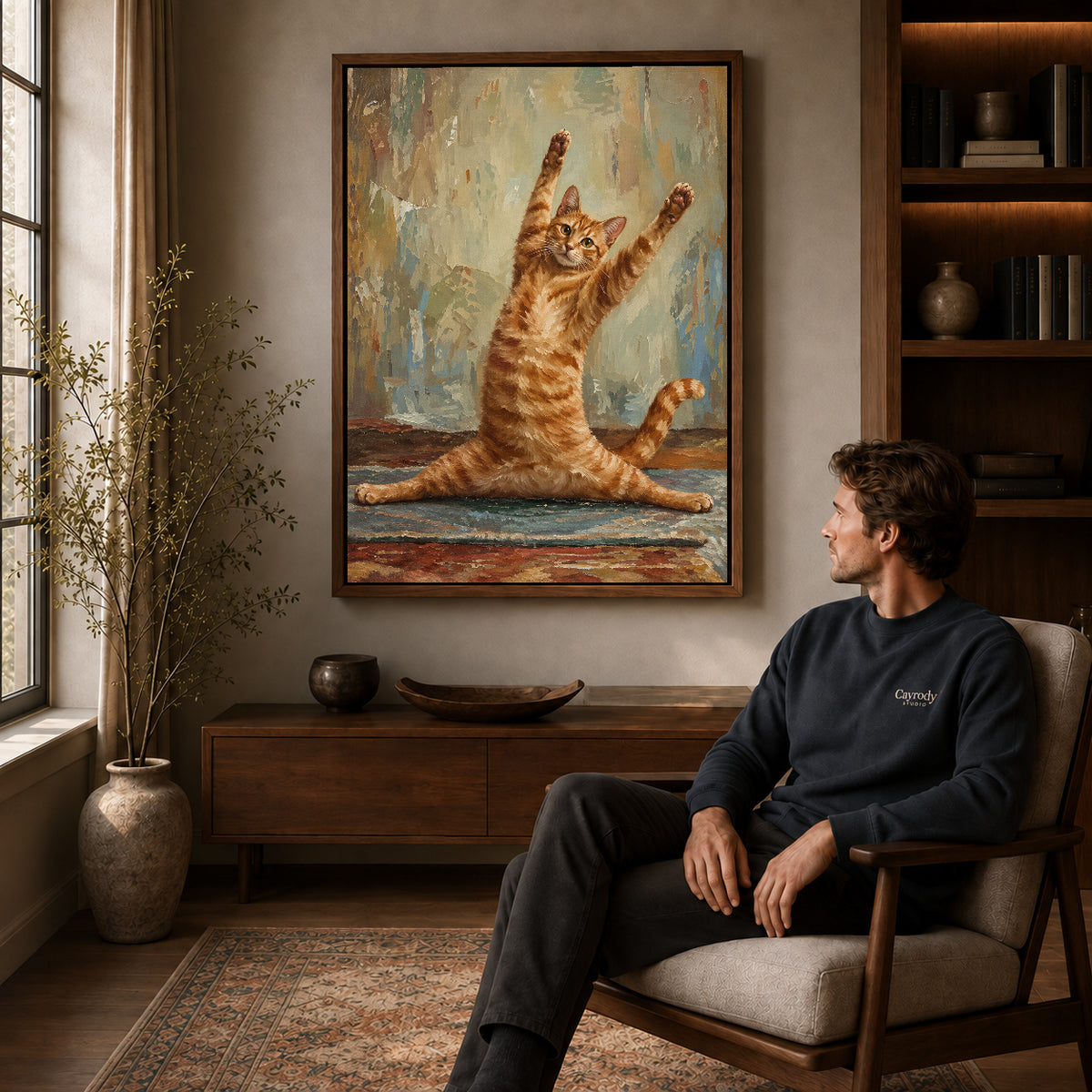 Funny Cat Canvas Art displayed in a walnut frame above wooden furniture beside a seated man.