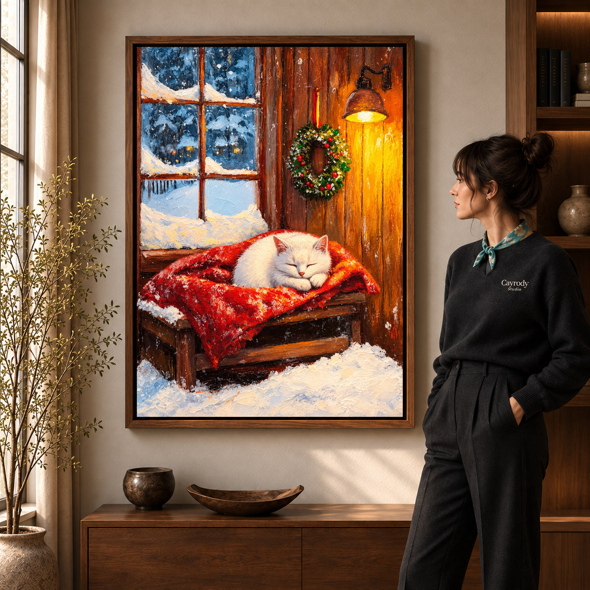 Walnut framed winter kitten canvas art with the complete artwork displayed in a warm living room.