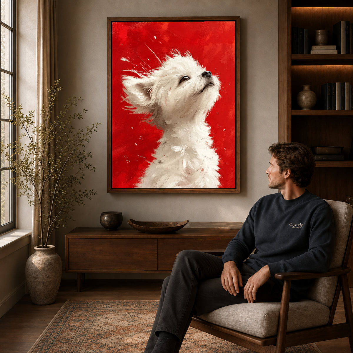 White Puppy Canvas Art displayed in a walnut frame above wooden furniture beside a seated man.