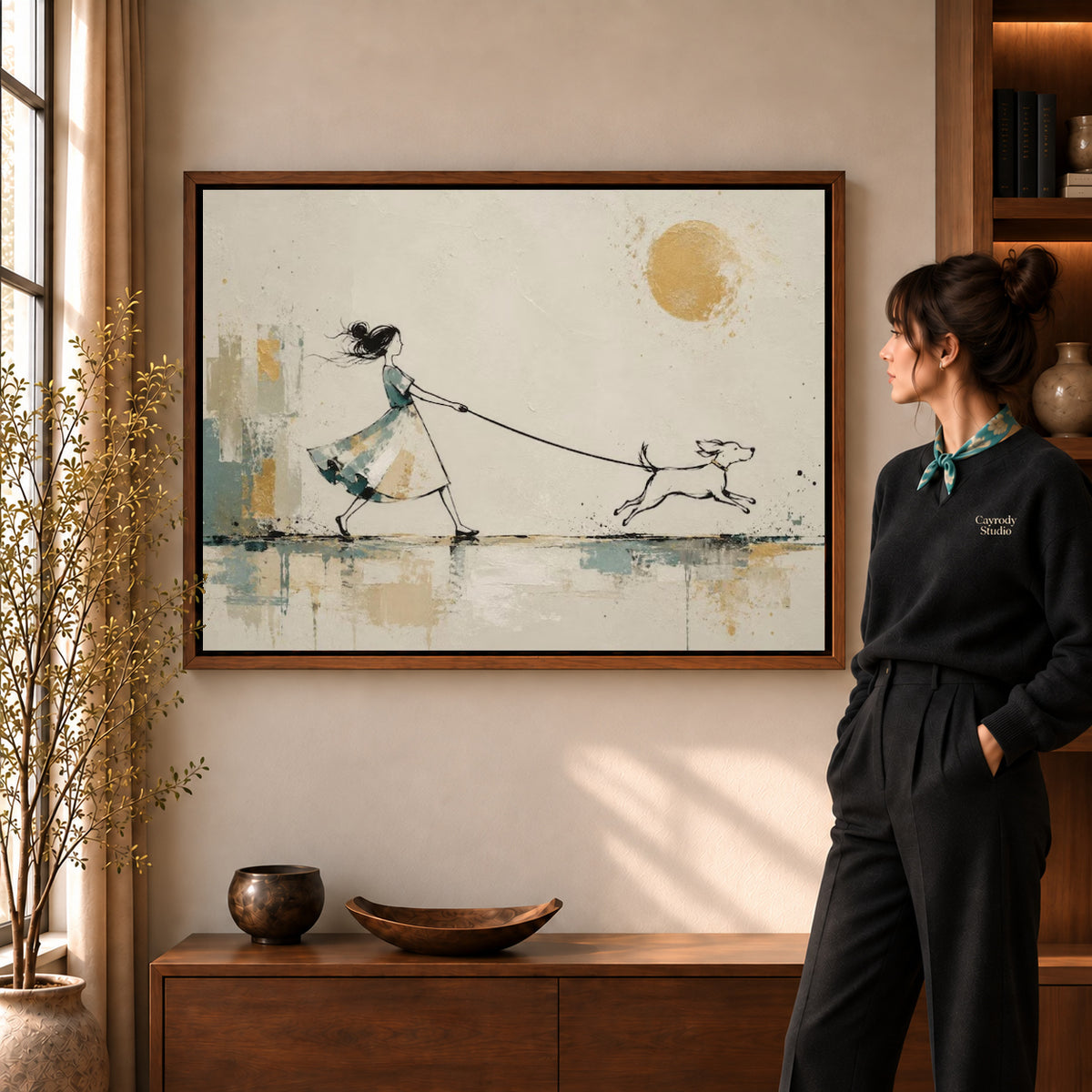 Dog Walking Canvas Art in a walnut frame beside a standing woman and warm wooden furniture.