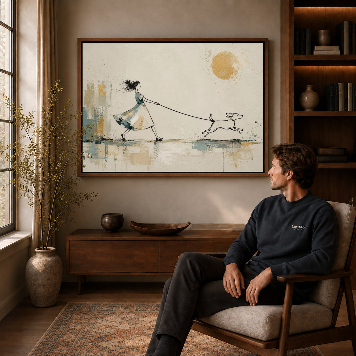 Dog Walking Canvas Art displayed in a walnut frame above wooden furniture beside a seated man.
