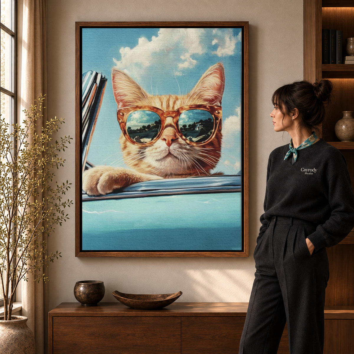 Retro Cat Canvas Art in a walnut frame beside a standing woman and warm wooden furniture.