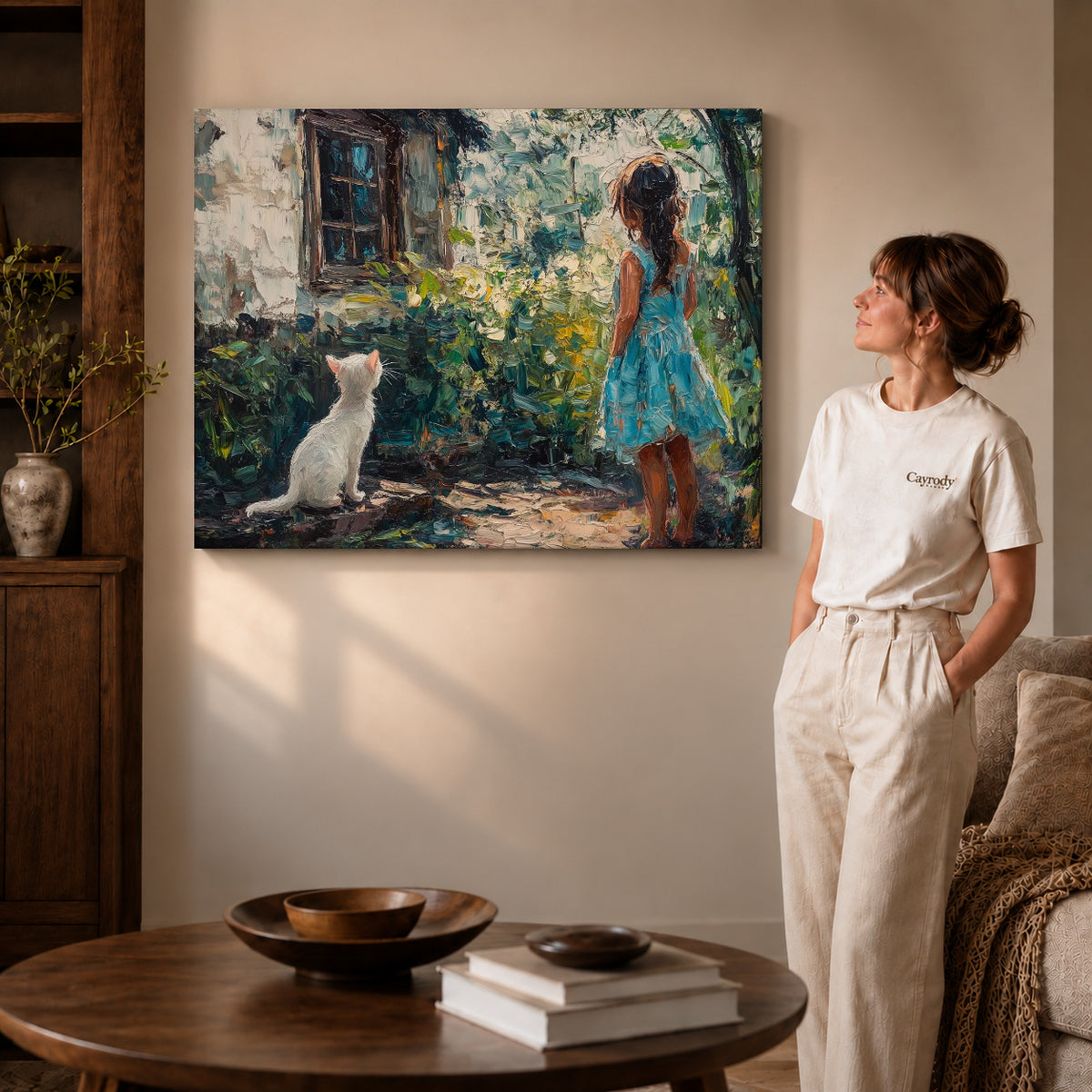 Gallery wrapped garden cat canvas art showing dimensional edges and soft shadows in a living room.