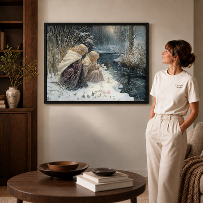 Black framed winter sisters canvas art displayed beside a woman with natural light across the wall.