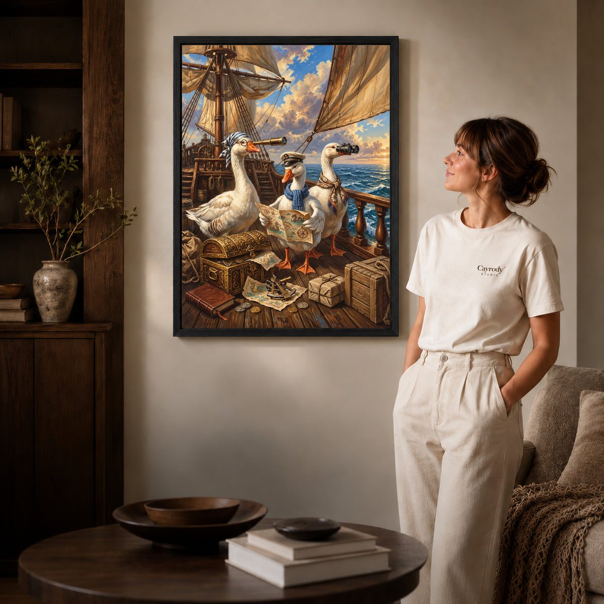 Sailing Geese Canvas Art inside a black frame in a softly lit living room with books.