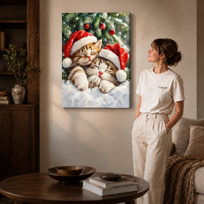 Christmas Kittens Canvas Art on gallery wrapped canvas with visible depth beside a woman in white.