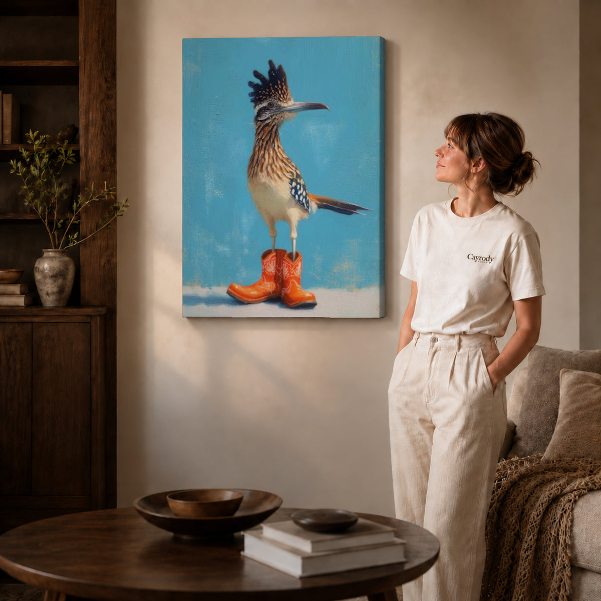 Roadrunner Canvas Art on gallery wrapped canvas with visible depth beside a woman in white.