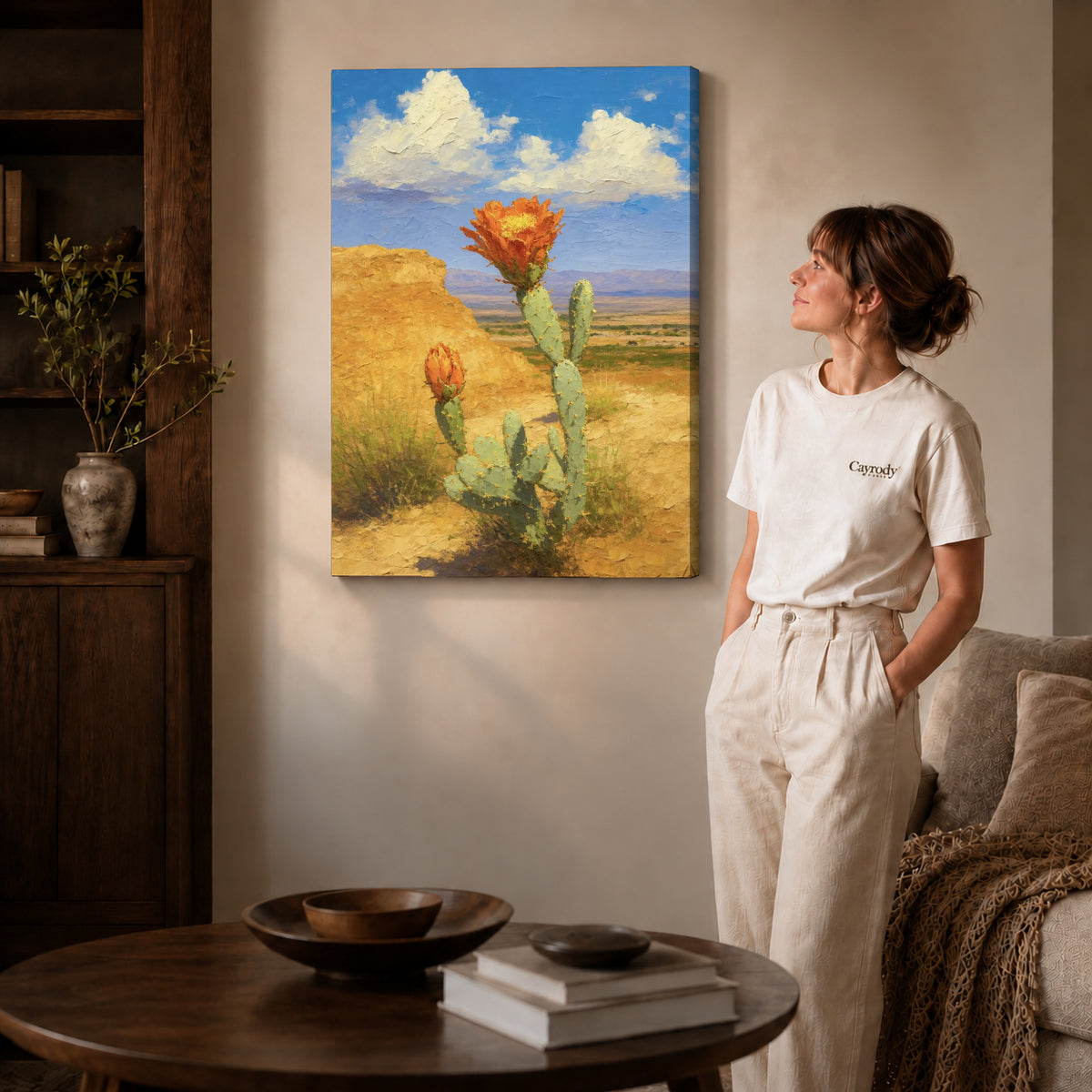 Cactus Canvas Art on gallery wrapped canvas with visible depth beside a woman in white.