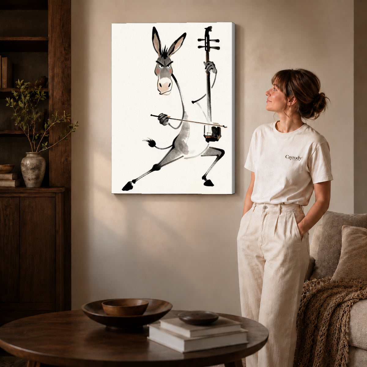 Musical Donkey Canvas Art on gallery wrapped canvas with visible depth beside a woman in white.