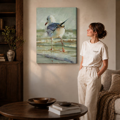 Seagull Canvas Art on gallery wrapped canvas with visible depth beside a woman in white.