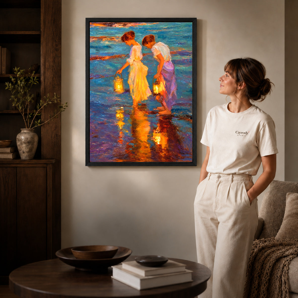 Black framed lantern canvas wall art displayed beside a woman with natural light across the wall.