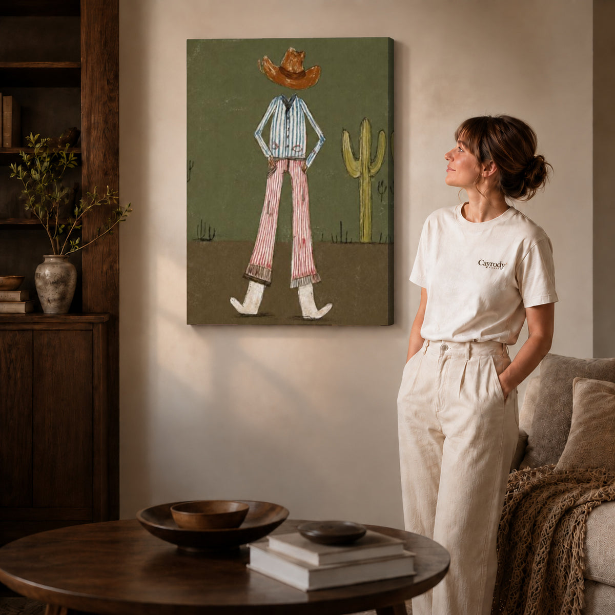 Cowboy Canvas Wall Art on gallery wrapped canvas with visible depth beside a woman in white.