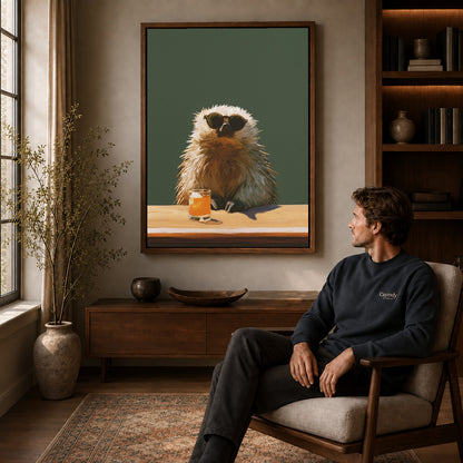 Capybara Canvas Wall Art displayed in a walnut frame above wooden furniture beside a seated man.