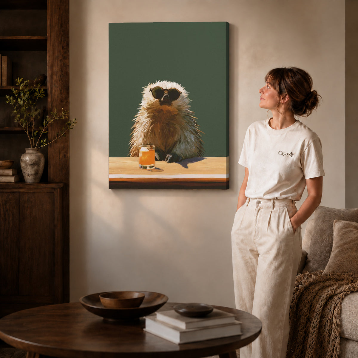 Capybara Canvas Wall Art on gallery wrapped canvas with visible depth beside a woman in white.