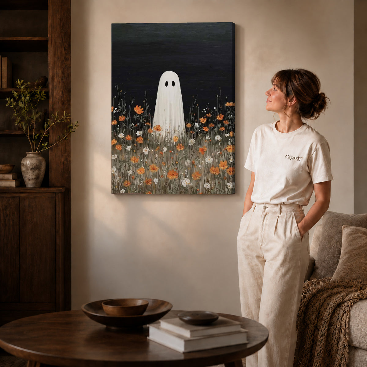 Ghost Canvas Wall Art on gallery wrapped canvas with visible depth beside a woman in white.