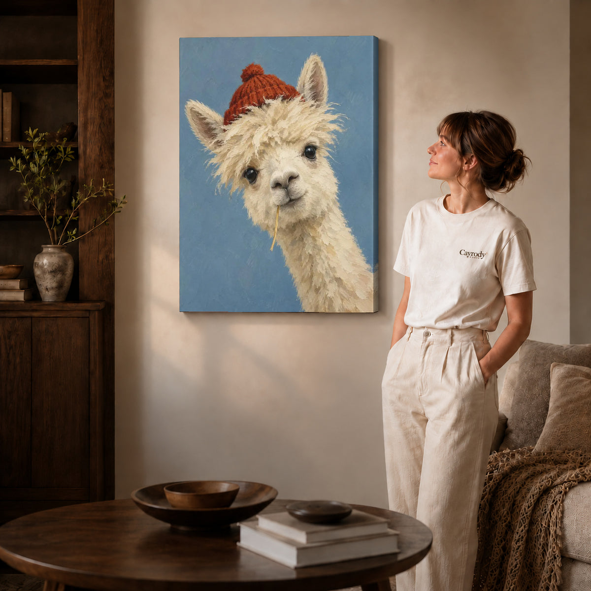 Llama Canvas Wall Art on gallery wrapped canvas with visible depth beside a woman in white.