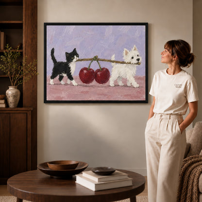 Black framed cat dog canvas art displayed beside a woman with natural light across the wall.