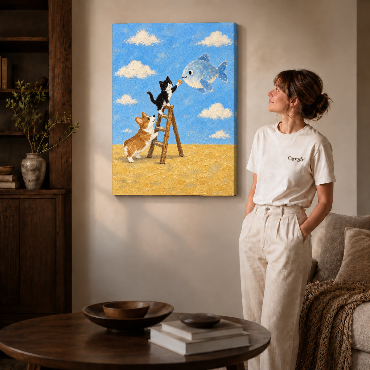 Whimsical Cat Canvas Art on gallery wrapped canvas with visible depth beside a woman in white.
