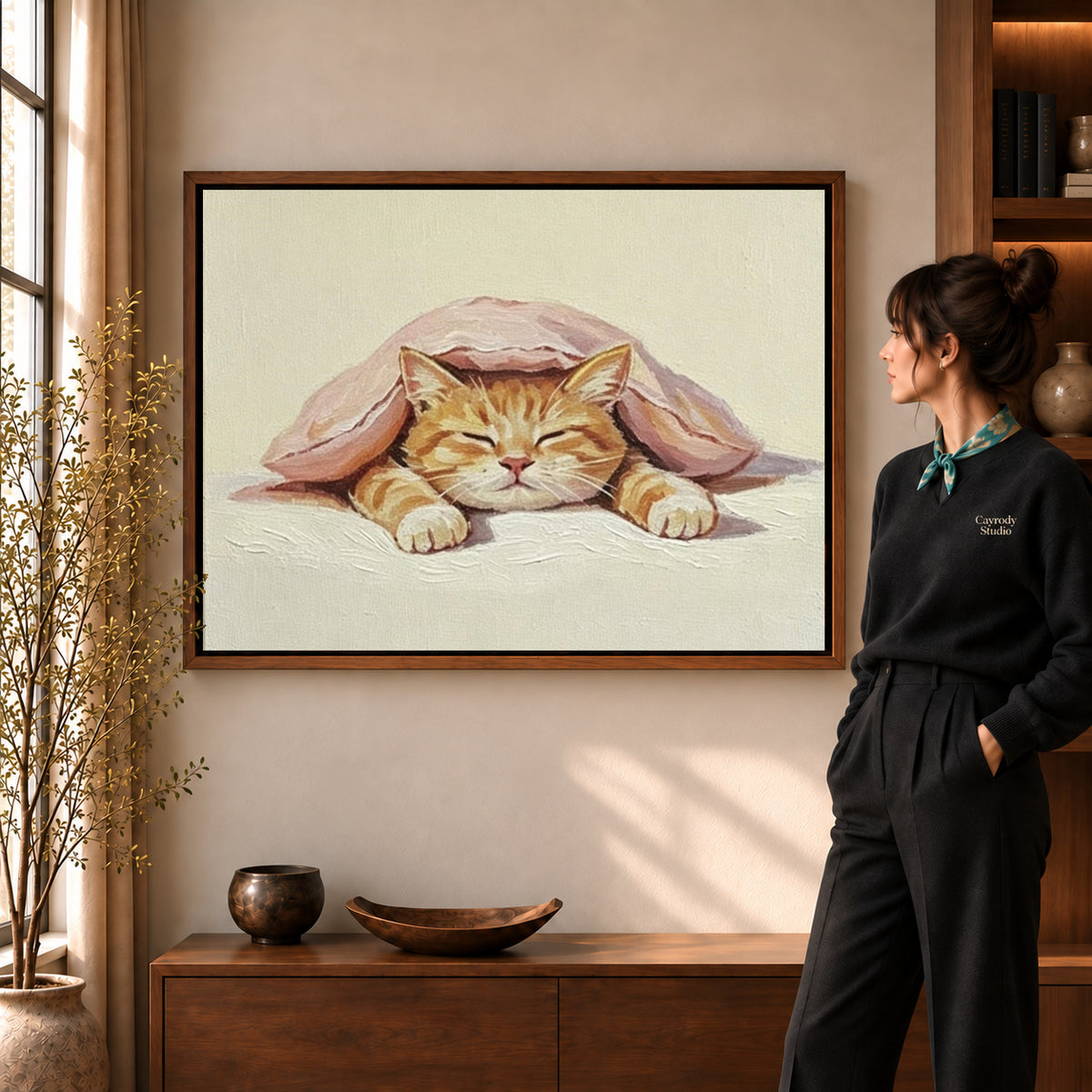 Walnut framed sleeping cat canvas art with the complete artwork displayed in a warm living room.