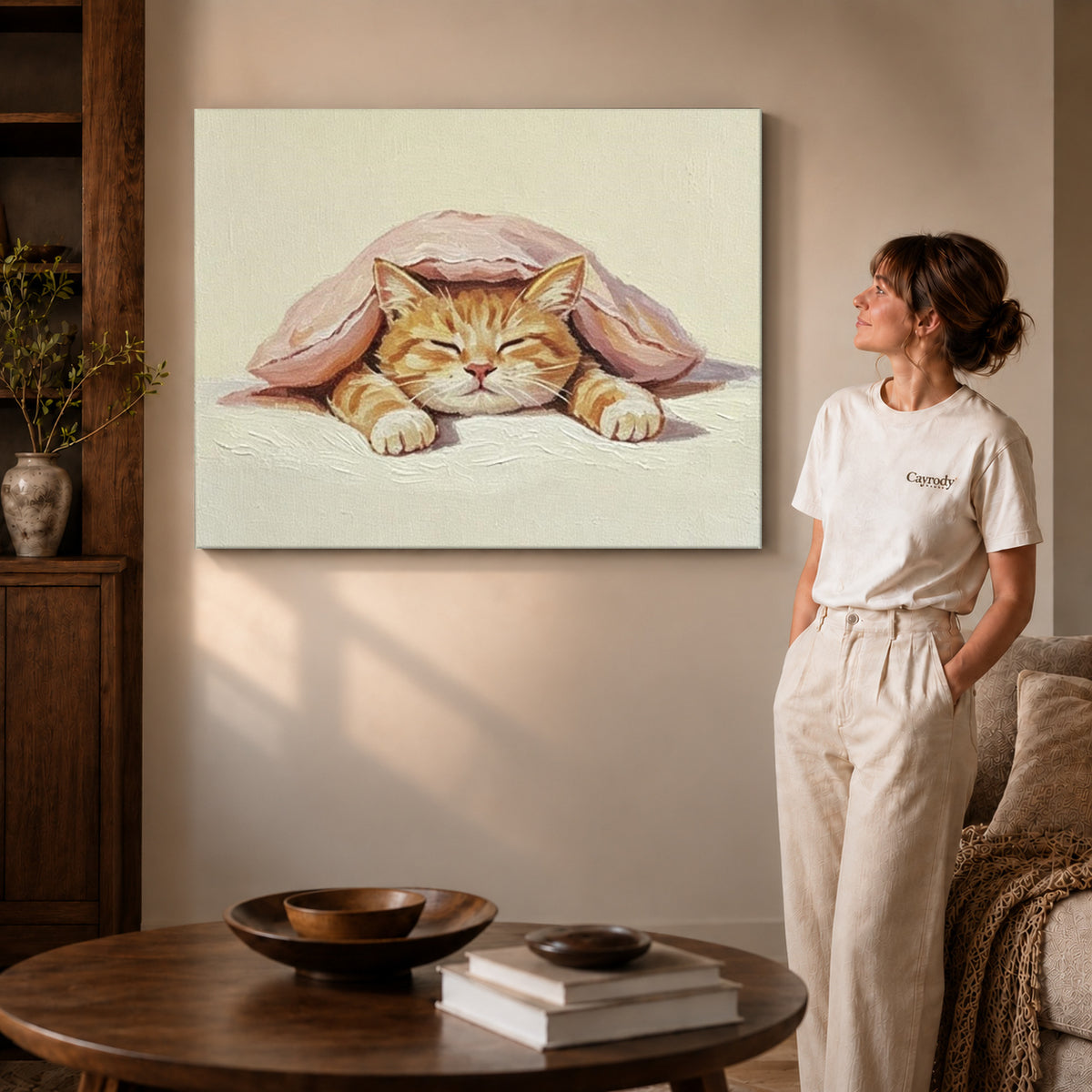 Gallery wrapped sleeping cat canvas art showing dimensional edges and soft shadows in a living room.