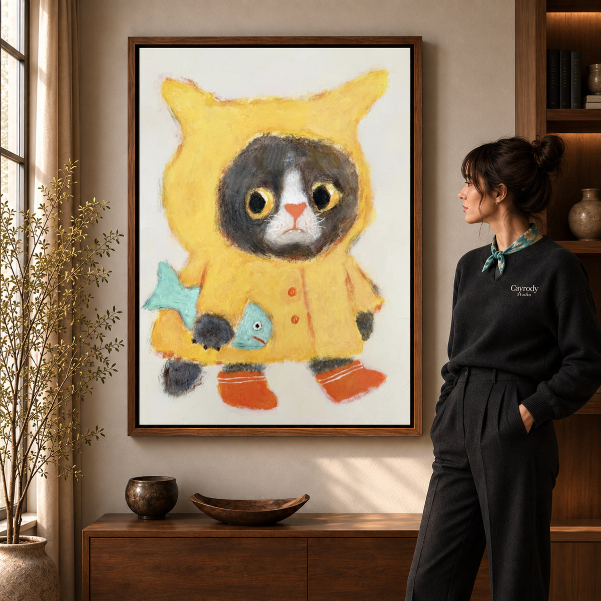 Walnut framed raincoat cat canvas art with the complete artwork displayed in a warm living room.