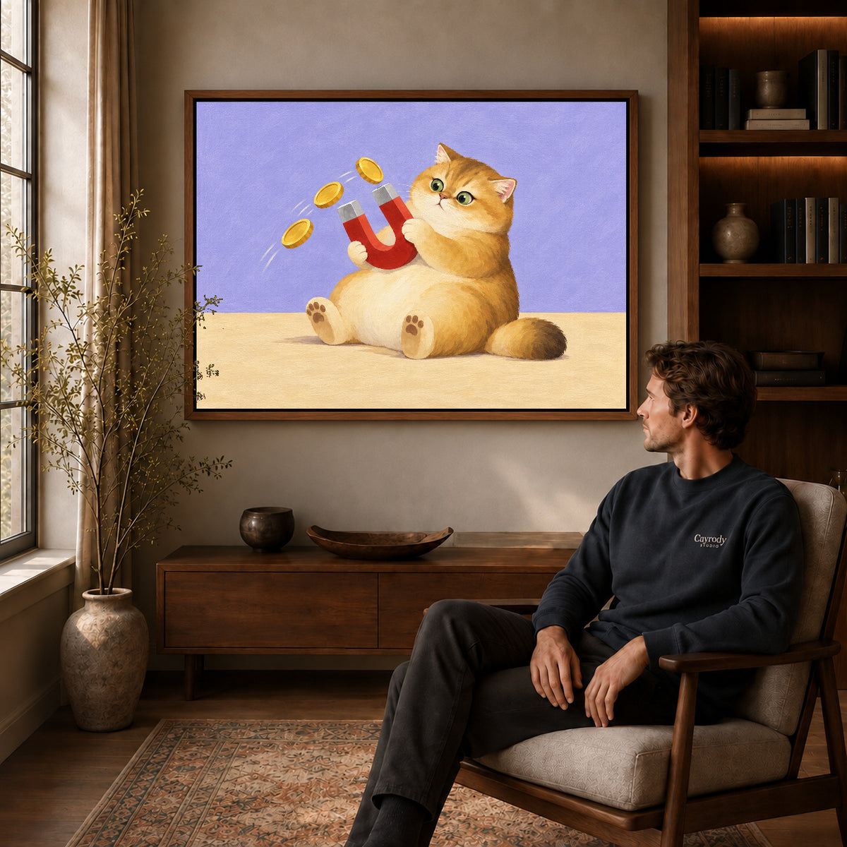 Golden Cat Canvas Art displayed in a walnut frame above wooden furniture beside a seated man.