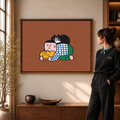 Walnut framed cuddling cats canvas art with the complete artwork displayed in a warm living room.