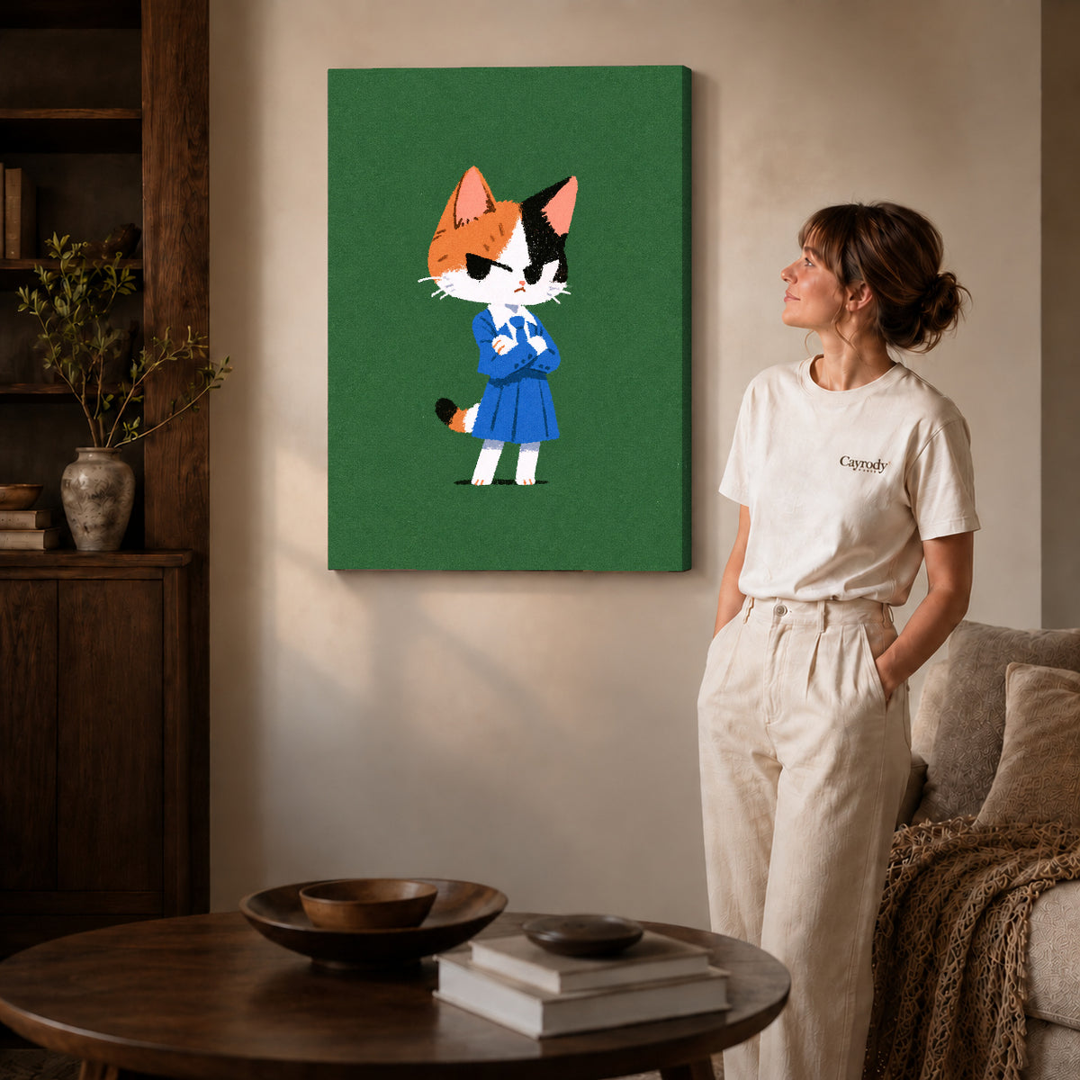 Schoolday Cat Canvas Art on gallery wrapped canvas with visible depth beside a woman in white.