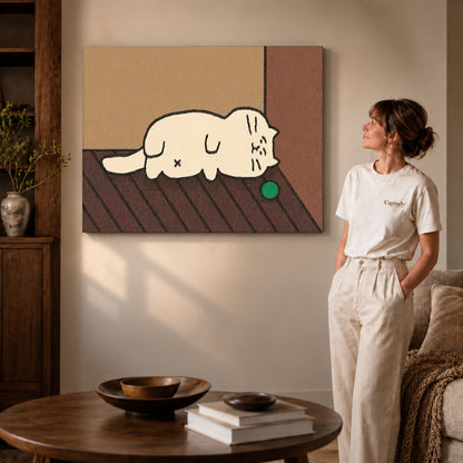 Gallery wrapped sleepy cat canvas art showing dimensional edges and soft shadows in a living room.