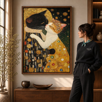 Walnut framed golden cat embrace canvas art with the complete artwork displayed in a warm living room.
