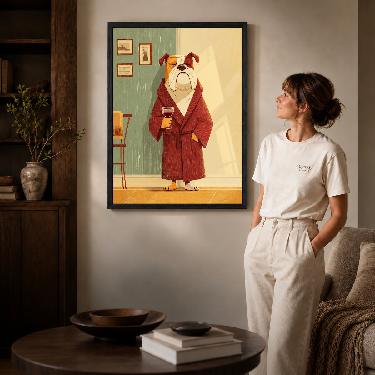 Black framed evening bulldog canvas art displayed beside a woman with natural light across the wall.