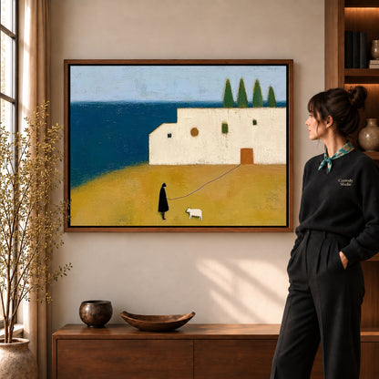 Coastal Companion Canvas Art in a walnut frame beside a standing woman and warm wooden furniture.