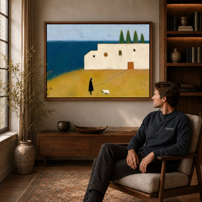 Coastal Companion Canvas Art displayed in a walnut frame above wooden furniture beside a seated man.