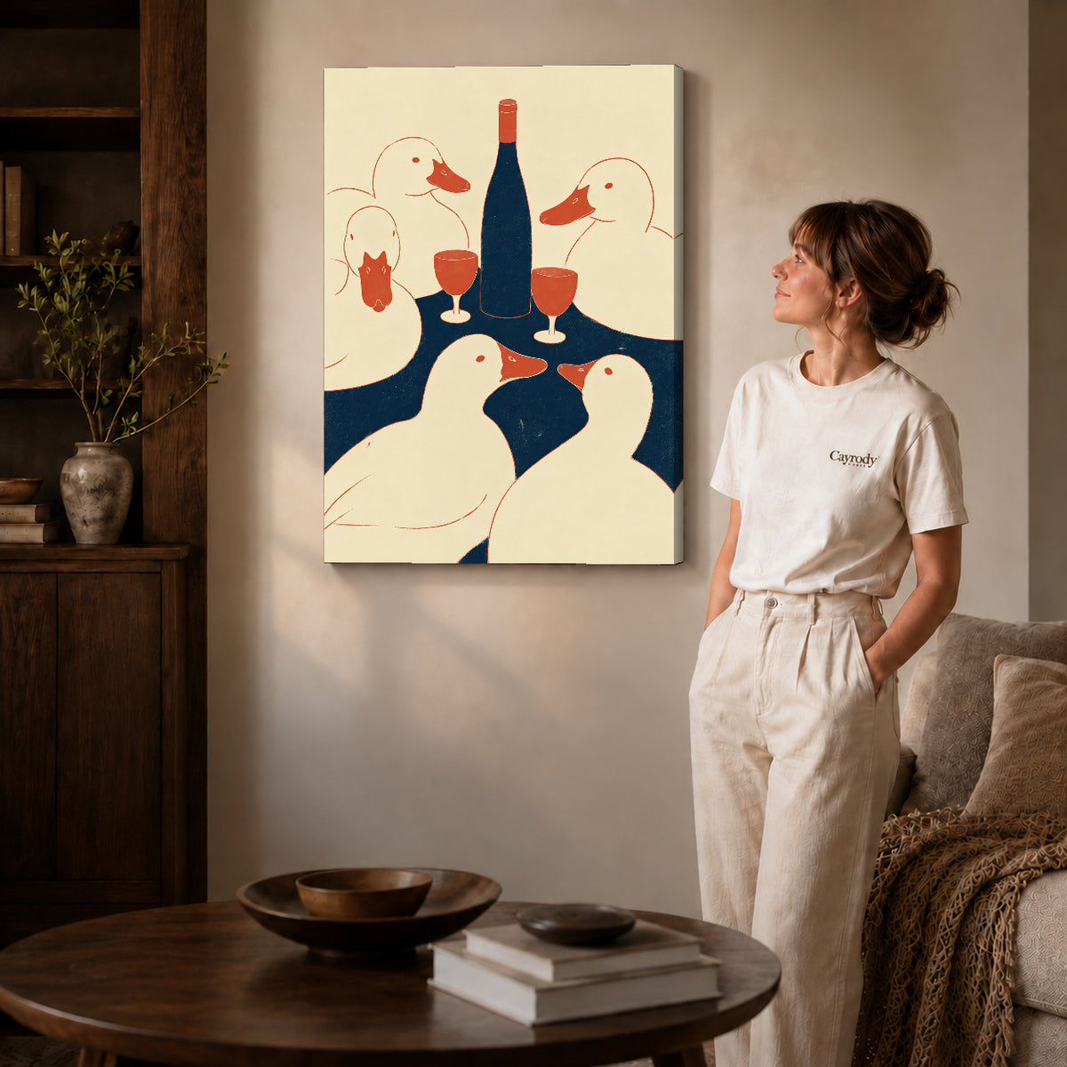 Ducks Toast Canvas Art on gallery wrapped canvas with visible depth beside a woman in white.