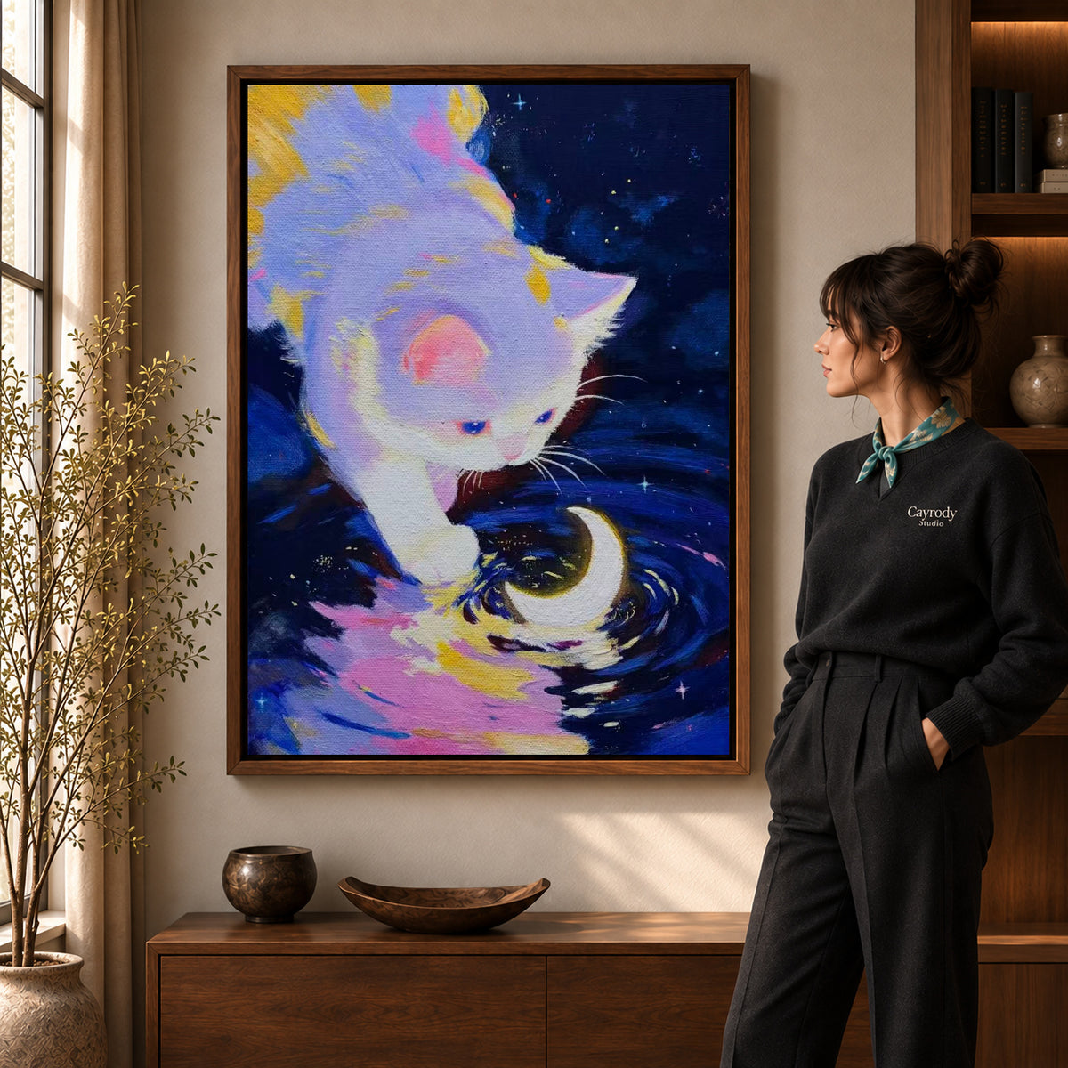 Walnut framed moonlit kitten canvas art with the complete artwork displayed in a warm living room.
