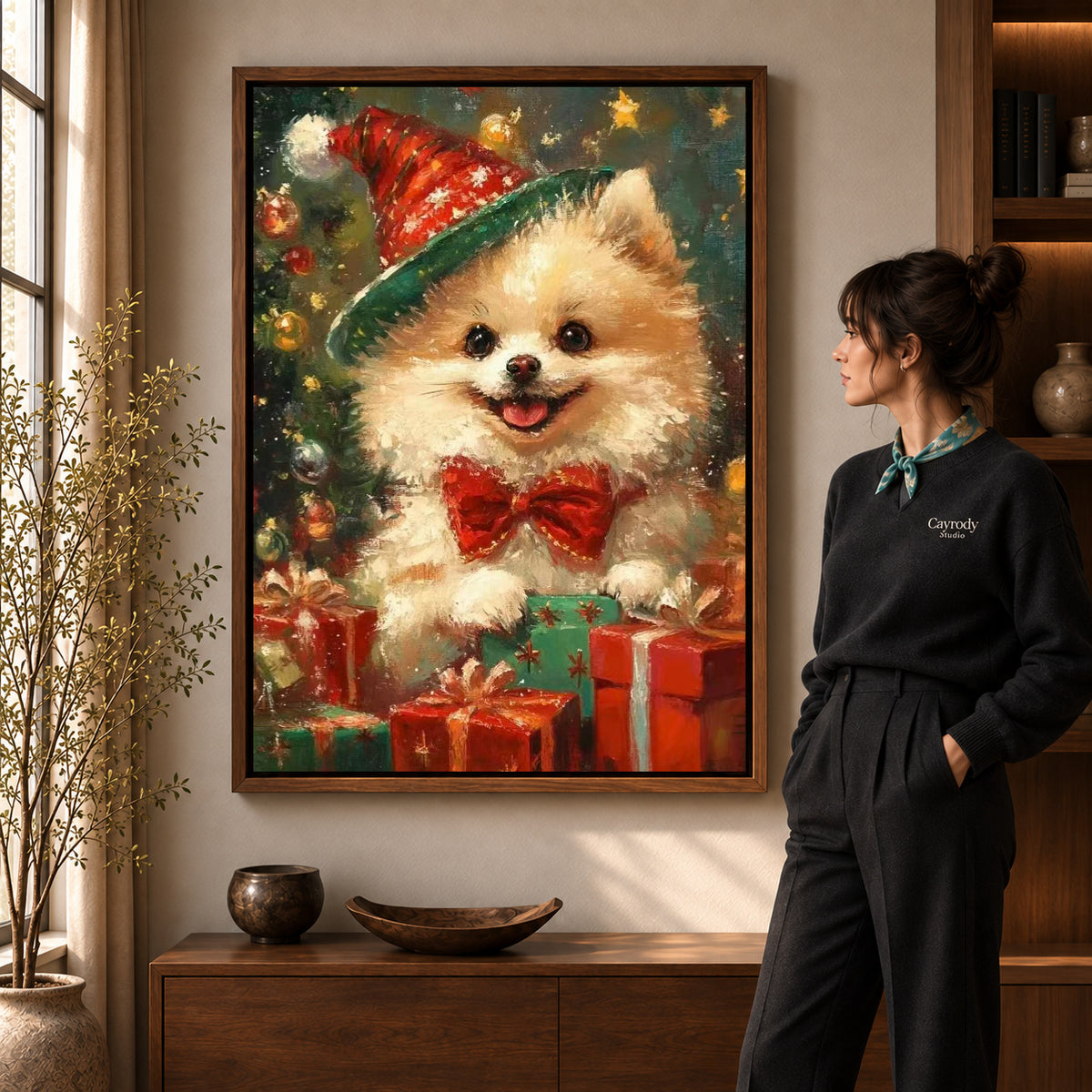 Festive Pomeranian Canvas Art in a walnut frame beside a standing woman and warm wooden furniture.