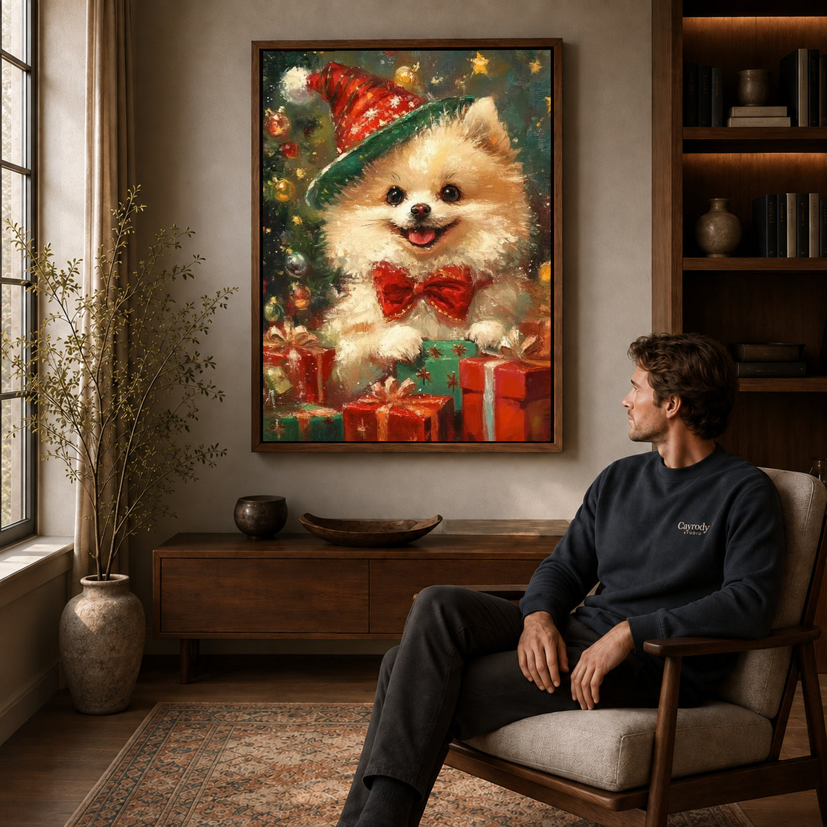 Festive Pomeranian Canvas Art displayed in a walnut frame above wooden furniture beside a seated man.