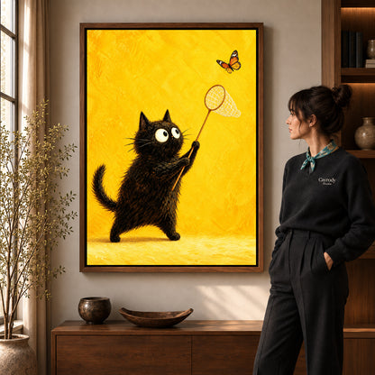 Funny butterfly cat canvas art in a walnut frame beside a woman in a warm living room.