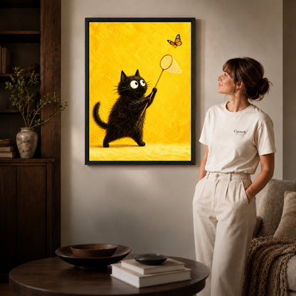 Black framed funny butterfly cat canvas art displayed beside a woman in a warm wood living room.
