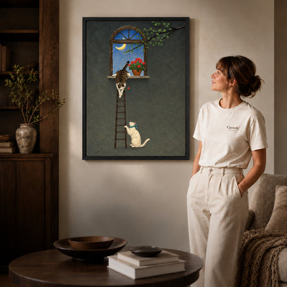 Black framed moonlit ladder cats canvas art displayed beside a woman in a warm wood living room.