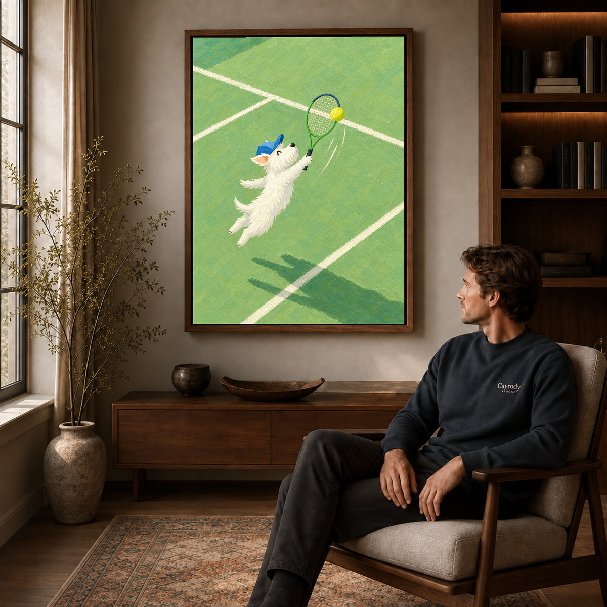 Walnut framed playful tennis dog canvas art above a seated man in a cozy wood furnished living room.