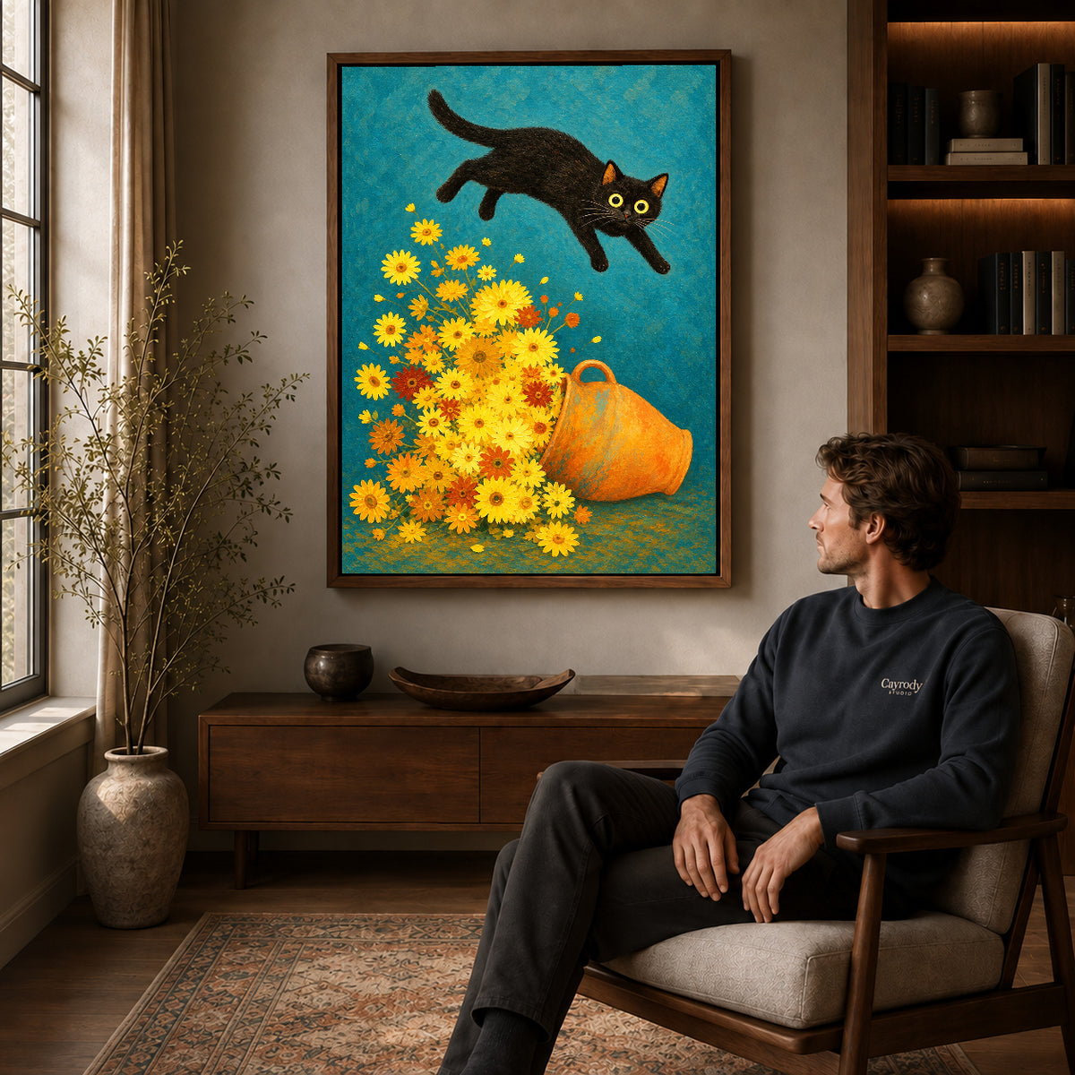 Walnut framed playful cat daisy canvas art above a seated man in a cozy wood furnished living room.