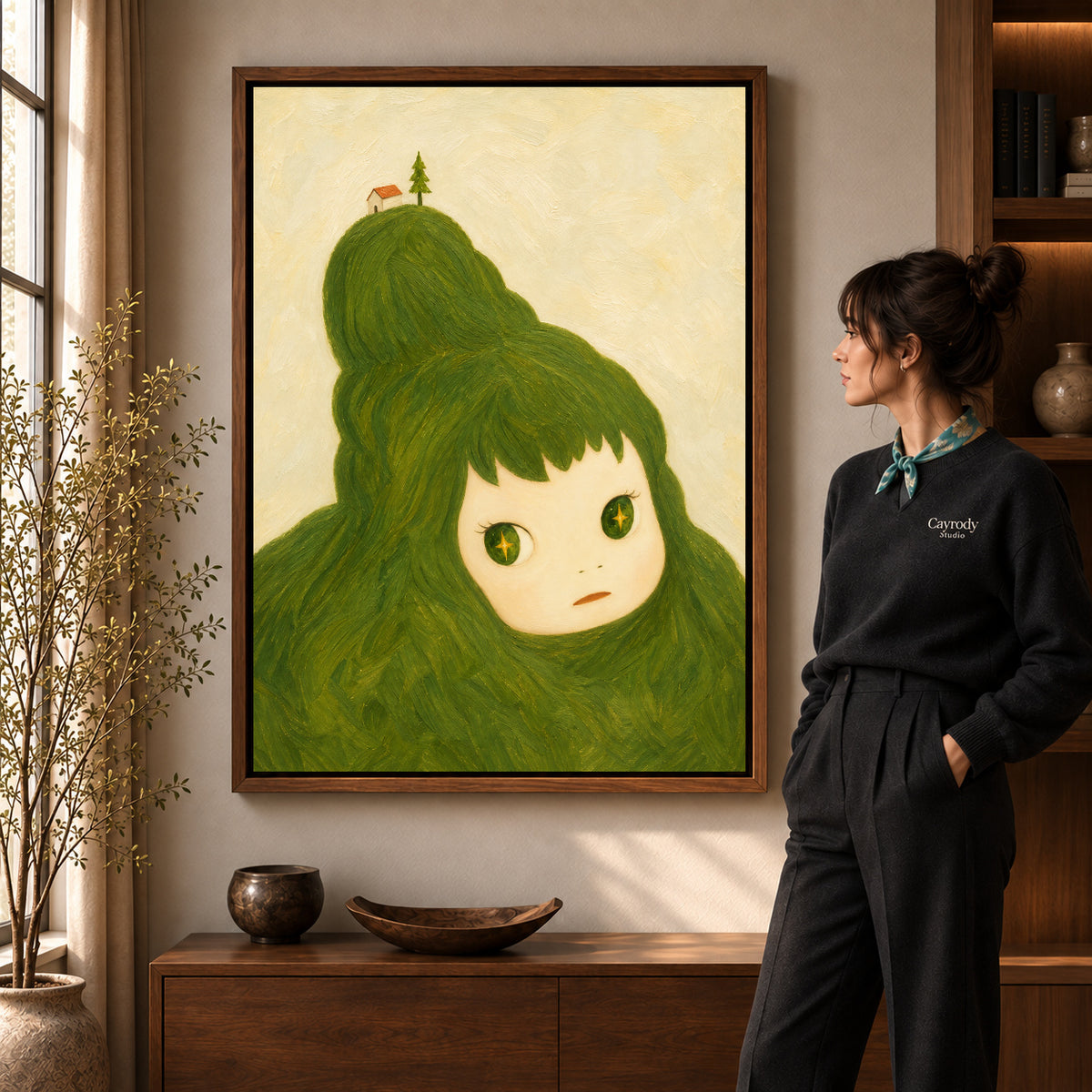 Dreamy green hair canvas art in a walnut frame beside a woman in a warm living room.