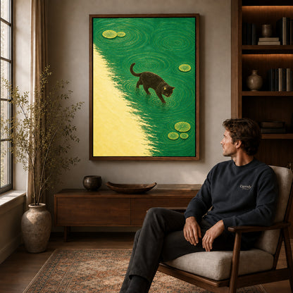 Walnut framed water walking cat canvas art above a seated man in a cozy wood furnished living room.