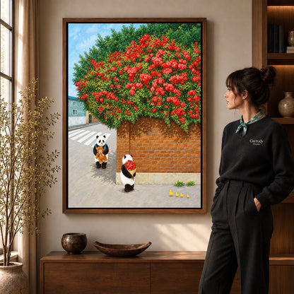 Panda rose bouquet canvas art in a walnut frame beside a woman in a warm living room.