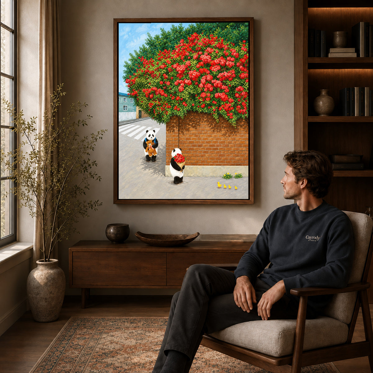 Walnut framed panda rose bouquet canvas art above a seated man in a cozy wood furnished living room.